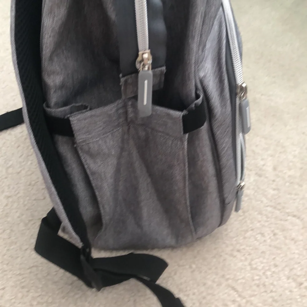 Baby changing gray backpack with multiple pockets